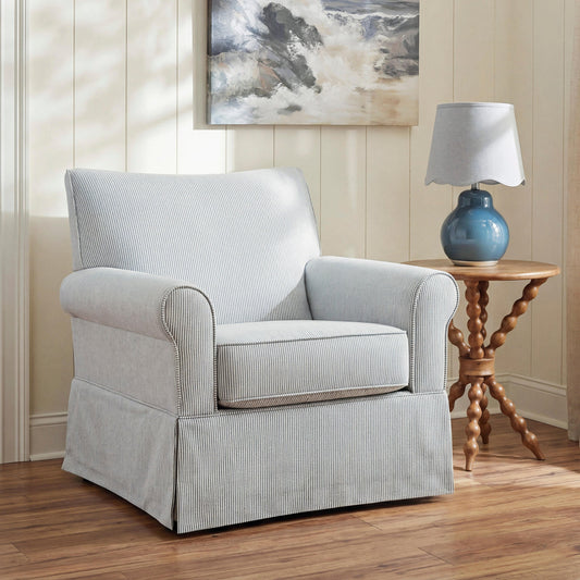 Light blue and cream striped accent chair in a living room