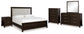 Neymorton King Upholstered Panel Bed with Mirrored Dresser, Chest and Nightstand