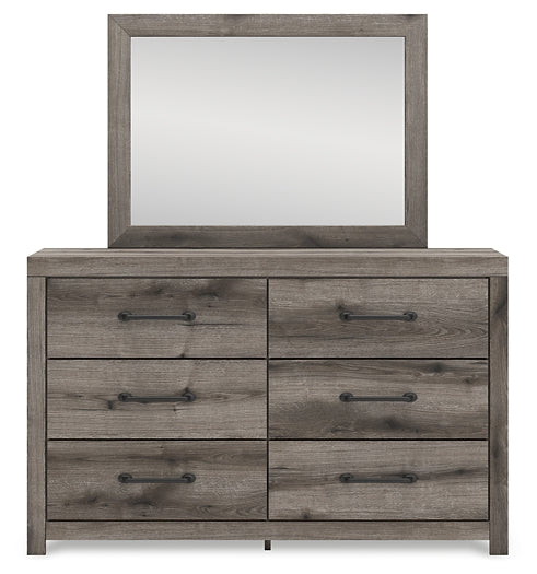 Graystorm King Panel Bed with Mirrored Dresser, Chest and Nightstand