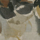 Close-up of cream, green, and brown floral upholstery