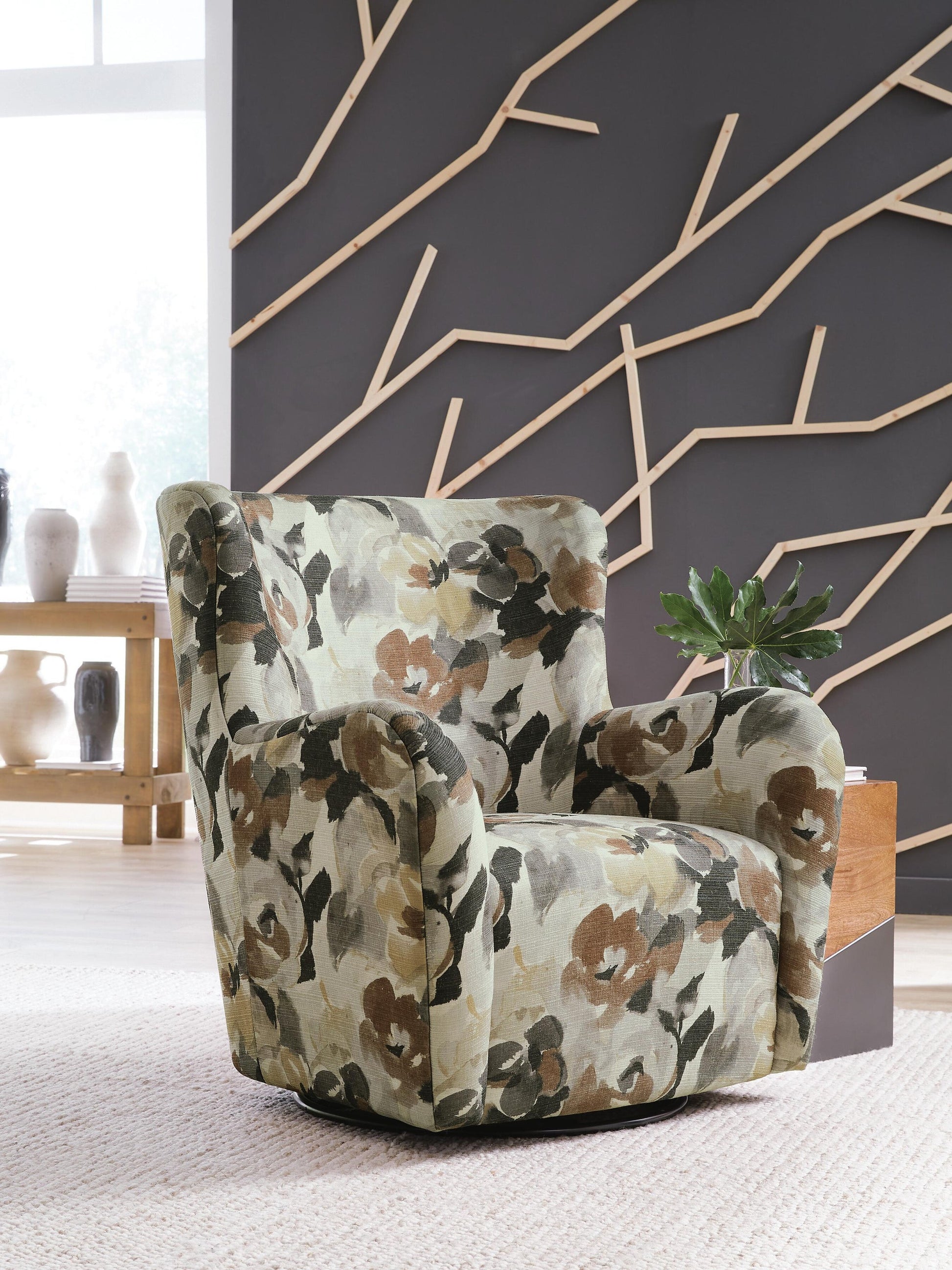 Floral accent chair on a round rug in a living room setting