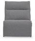 Gray upholstered armless sectional seat, front view