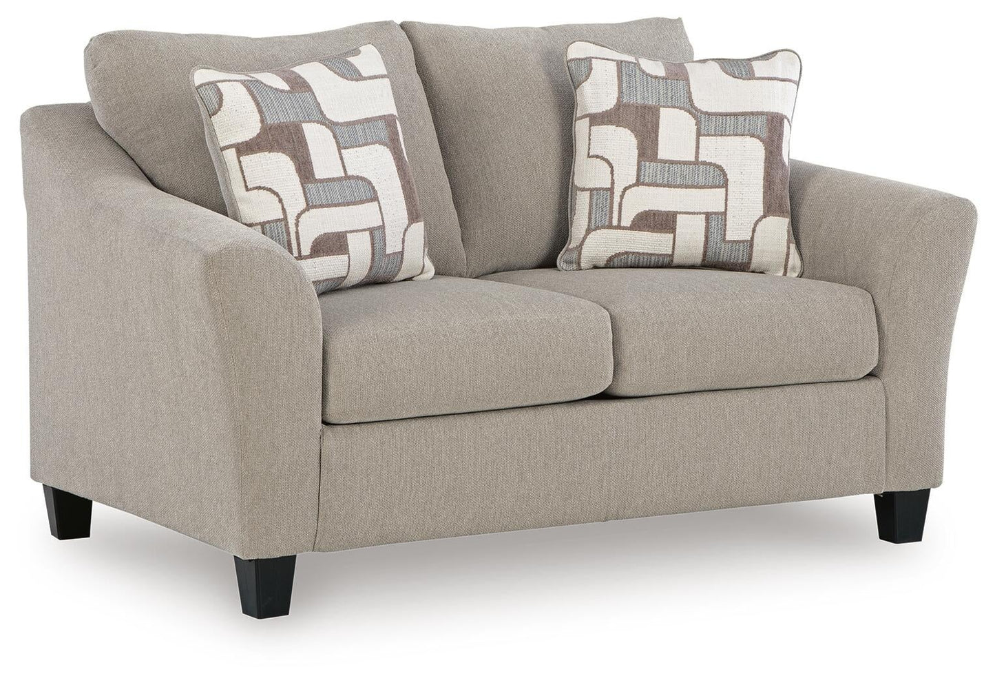 Beige upholstered accent chair with patterned pillows, angled view