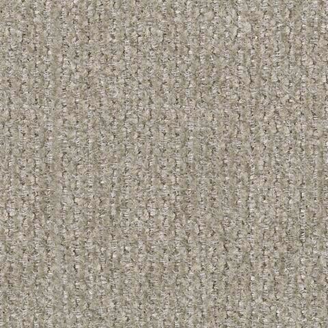 Close-up of textured beige upholstery fabric