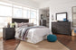 Brinxton King/California King Panel Headboard with Mirrored Dresser, Chest and Nightstand Milwaukee Furniture of Chicago - Furniture Store in Chicago Serving Humbolt Park, Roscoe Village, Avondale, & Homan Square