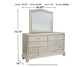 Coralayne Queen Upholstered Bed with Mirrored Dresser Milwaukee Furniture of Chicago - Furniture Store in Chicago Serving Humbolt Park, Roscoe Village, Avondale, & Homan Square